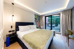 Vuode tai vuoteita majoituspaikassa Calisi Hotel