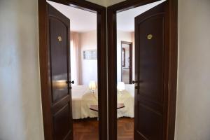 Postel nebo postele na pokoji v ubytování Hotel Sirio