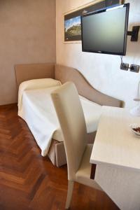 TV a/nebo společenská místnost v ubytování Hotel Sirio