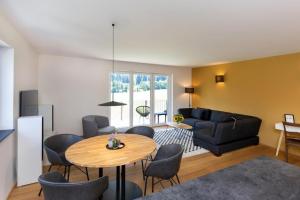 Χώρος καθιστικού στο Ferienwohnungen Friedenshöhe in Oberammergau