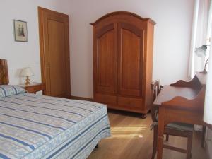 A bed or beds in a room at Agriturismo Villa Selvatico