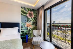 Vuode tai vuoteita majoituspaikassa Calisi Hotel
