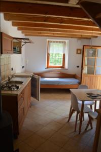 Kuchyň nebo kuchyňský kout v ubytování B&B Arlanch 8