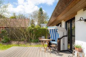 Balkón nebo terasa v ubytování Ferienhaus Buttje