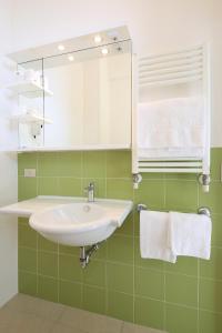 Koupelna v ubytování Hotel Caravel