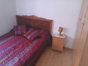 Ένα ή περισσότερα κρεβάτια σε δωμάτιο στο Camariñas Centro 3