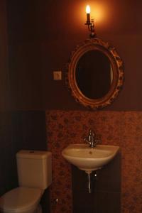 Phòng tắm tại Akmenių Dvaras