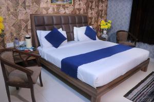 Hotel Panache 500 Mtrs From Shri Krishna Janma bhumi Teample客房内的一张或多张床位