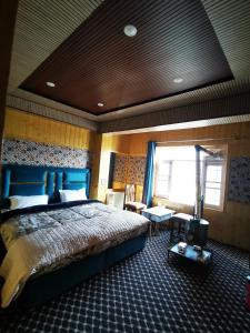 Postel nebo postele na pokoji v ubytování Siddiq gust house + 2 fotografie