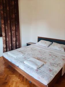Postel nebo postele na pokoji v ubytování Nina Apartments