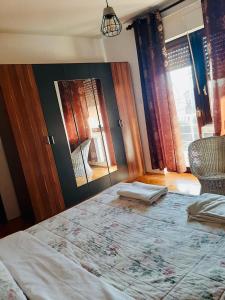 Postel nebo postele na pokoji v ubytování Nina Apartments