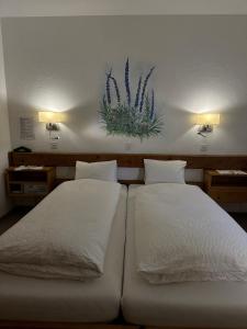 Voodi või voodid majutusasutuse Hotel Acla Filli toas
