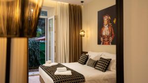 Voodi või voodid majutusasutuse CLOUD 5 Blloku Rooms Tirana toas