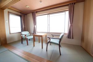 鲷丸海月 海滨酒店(Taimaru Kaigetsu)的休息区