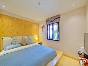 Postel nebo postele na pokoji v ubytování Jianshui Fanqi Boutique B&B