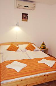 Postel nebo postele na pokoji v ubytování Hotel Magnólia