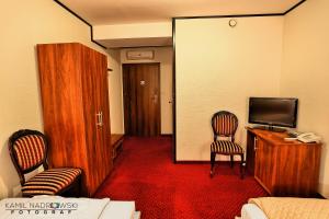 TV a/nebo společenská místnost v ubytování Hotel Zodiak