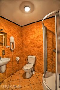 Koupelna v ubytování Hotel Zodiak