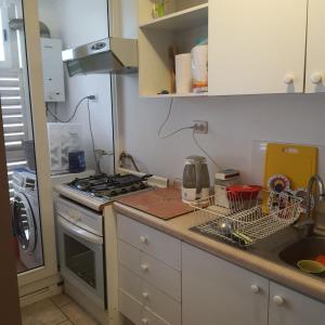 Kuchyň nebo kuchyňský kout v ubytování Departamento Los Bosques del Tabo