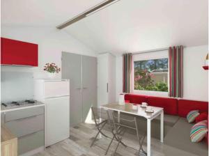 Η κουζίνα ή μικρή κουζίνα στο Domaine Résidentiel de Plein Air La Canadienne