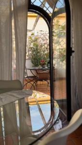 Swimmingpoolen hos eller tæt på Attico Le Castelline