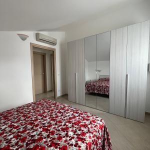 Un pat sau paturi într-o cameră la Casa Merlino
