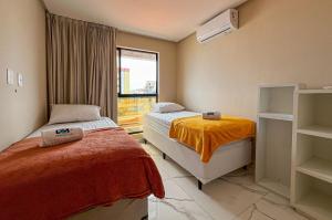 Postel nebo postele na pokoji v ubytování Duplex Melhor Localização do Bessa 200m Praia + 18 fotografií