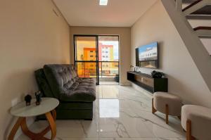 TV a/nebo společenská místnost v ubytování Duplex Melhor Localização do Bessa 200m Praia