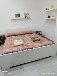 Postel nebo postele na pokoji v ubytování casa di Igor