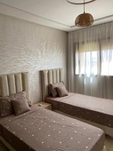 Postel nebo postele na pokoji v ubytování Appartement Tamaris