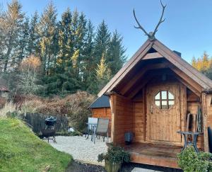 Dārzs pie naktsmītnes The Nest Glamping Pod