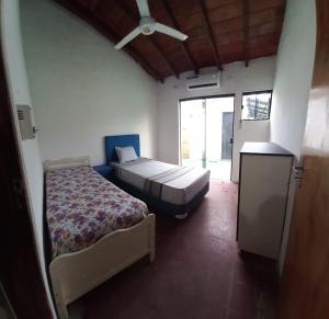 Ліжко або ліжка в номері Casa mono ambiente y piscina.