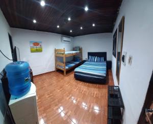 Ліжко або ліжка в номері Casa mono ambiente y piscina.