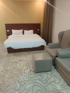 Postel nebo postele na pokoji v ubytování Bait AL-Afiah Apartments