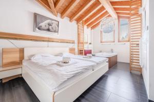 Ski Paradise SP 012 - MOUNTAIN apartment 8 pers房間的床