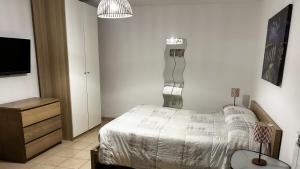 Postel nebo postele na pokoji v ubytování 4Flats in Orto di Venanzio