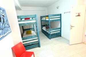 Posteľ alebo postele v izbe v ubytovaní White Rabbit Hostel