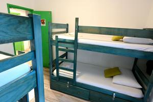 Posteľ alebo postele v izbe v ubytovaní White Rabbit Hostel