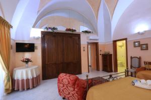 TV a/nebo společenská místnost v ubytování B&B La Villa