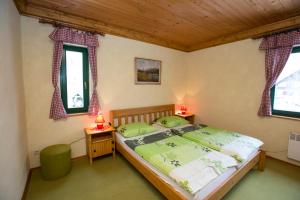 מיטה או מיטות בחדר ב-Cottage Suha