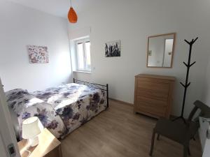 Postel nebo postele na pokoji v ubytování Bilocale per 2 - Quadrilocale per 6 - Appartamenti Sebastiani centralissimi