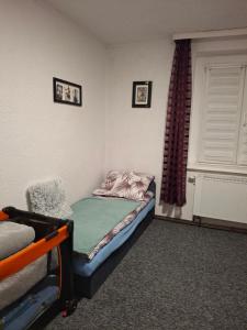 Posteľ alebo postele v izbe v ubytovaní Apartament LORD