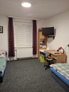 Posteľ alebo postele v izbe v ubytovaní Apartament LORD
