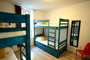 Posteľ alebo postele v izbe v ubytovaní White Rabbit Hostel