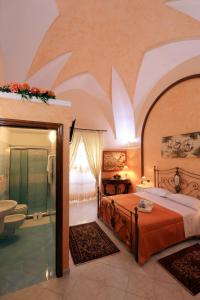 Postel nebo postele na pokoji v ubytování B&B La Villa