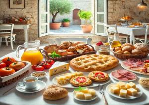 a table topped with lots of different types of food at Il Rhybasteinon in Ruvo di Puglia