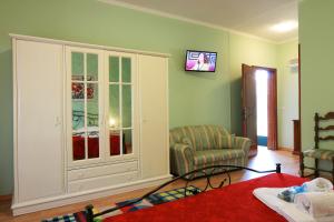 TV a/nebo společenská místnost v ubytování B&B La Villa