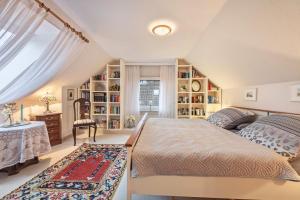 Ένα ή περισσότερα κρεβάτια σε δωμάτιο στο Haus Herzog