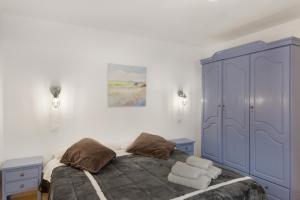 Ένα ή περισσότερα κρεβάτια σε δωμάτιο στο Casa Paula - 25 +18 φωτογραφίες