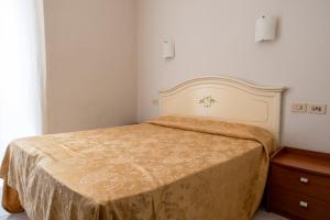 Ένα ή περισσότερα κρεβάτια σε δωμάτιο στο Hotel Ventura +3 φωτογραφίες